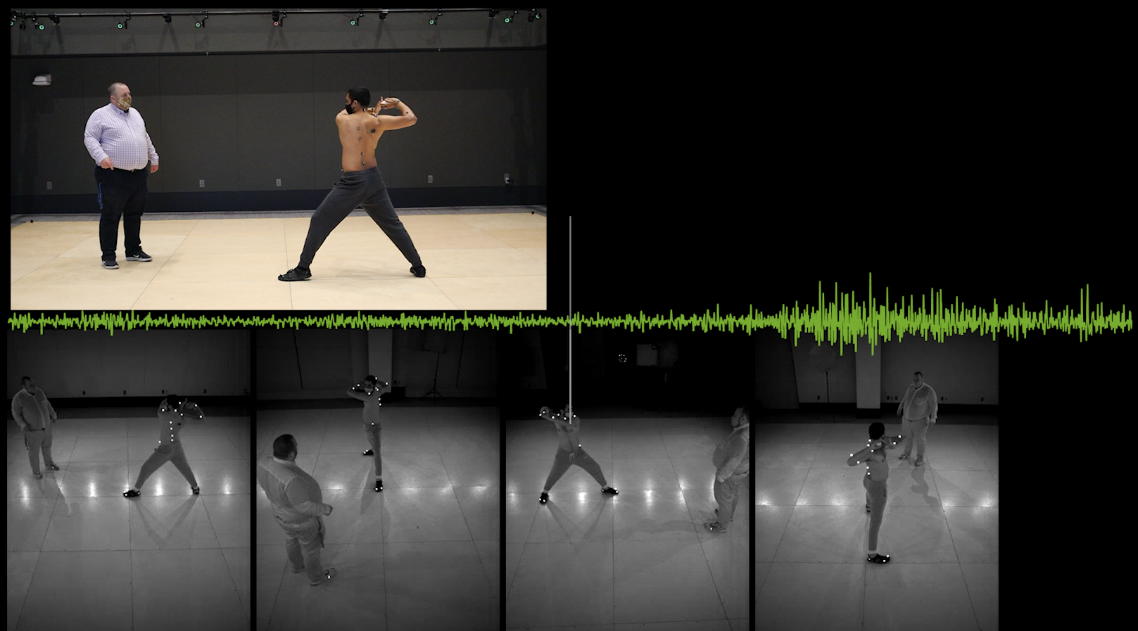 Two people study baseball swing using physiological measurement tools of the MIT.nano Immersion Lab and MIT Clinical Research Center